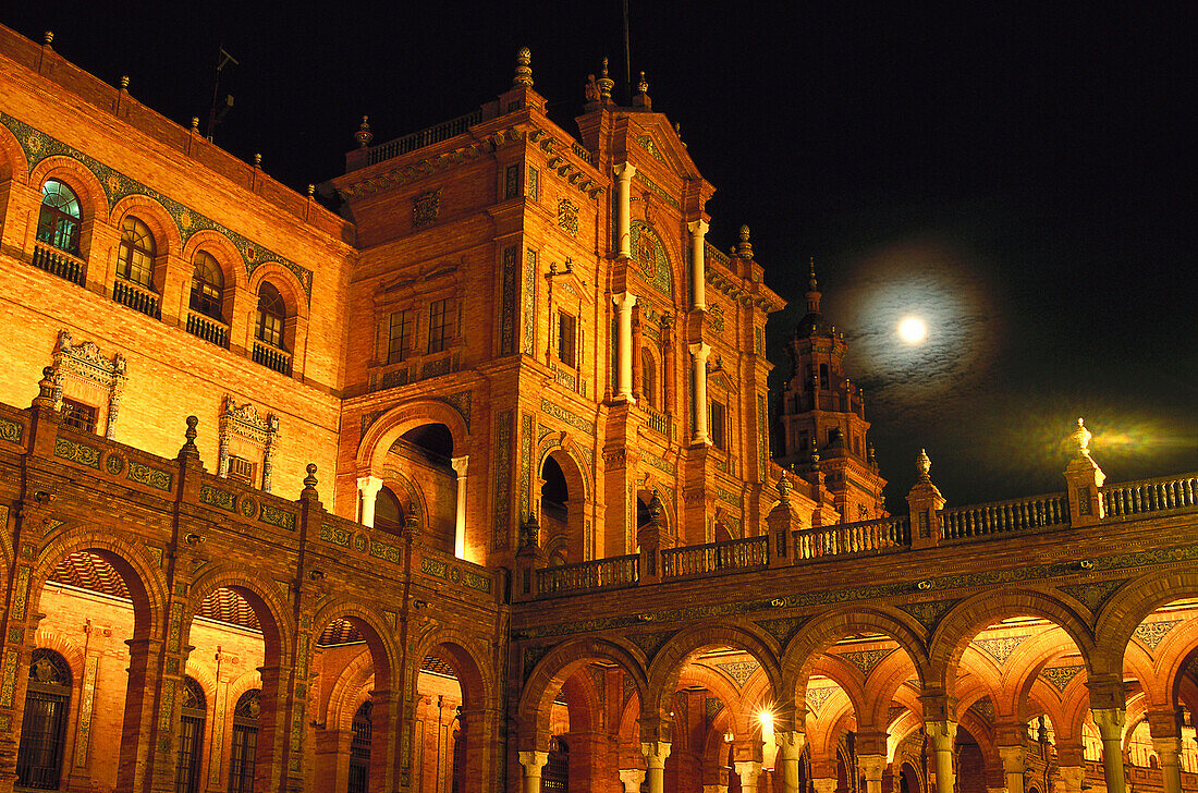Buildings of Plaza de Espana at night, Seville, Andalusia, Spain, Europe