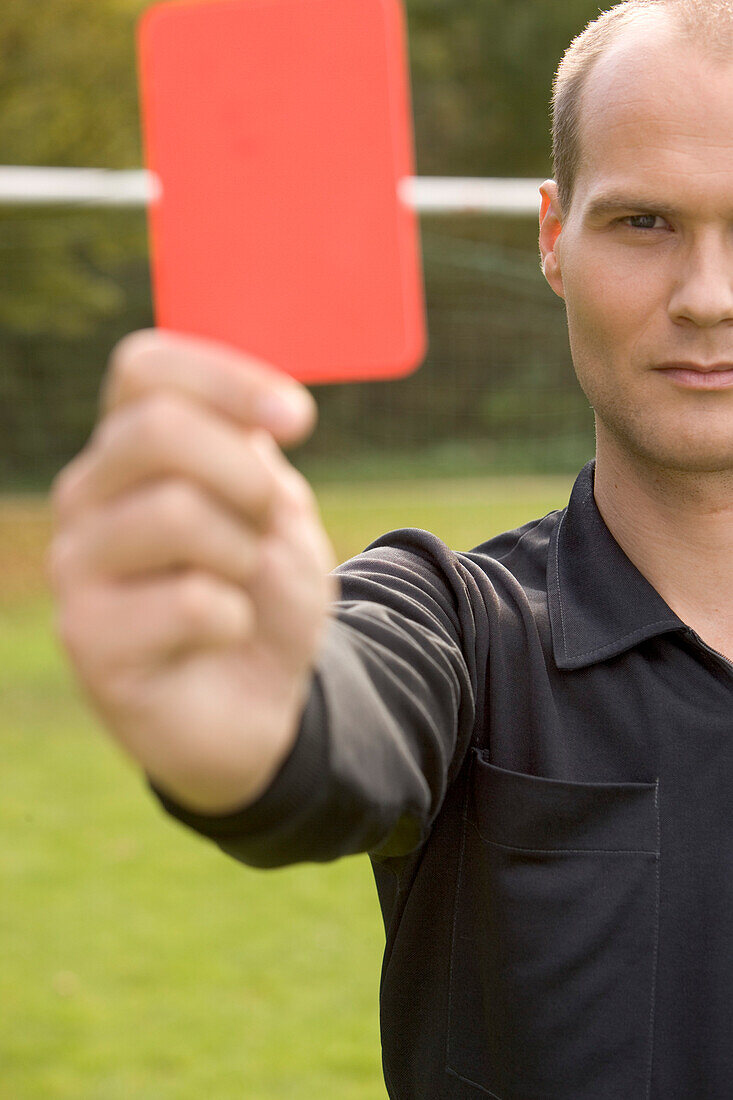 Referee showing red card