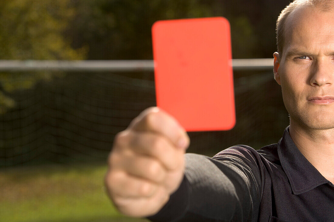 Referee showing red card