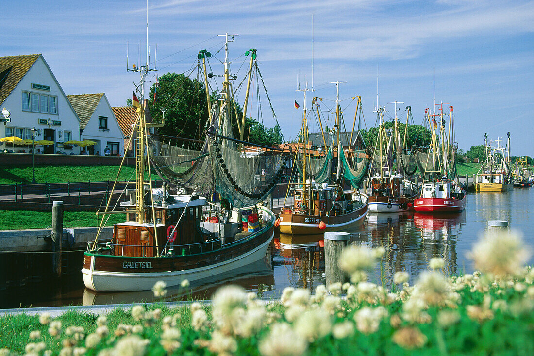 Fishing boats at Greetsiel harbor, Eastern Frisia, Lower Saxony, Germany