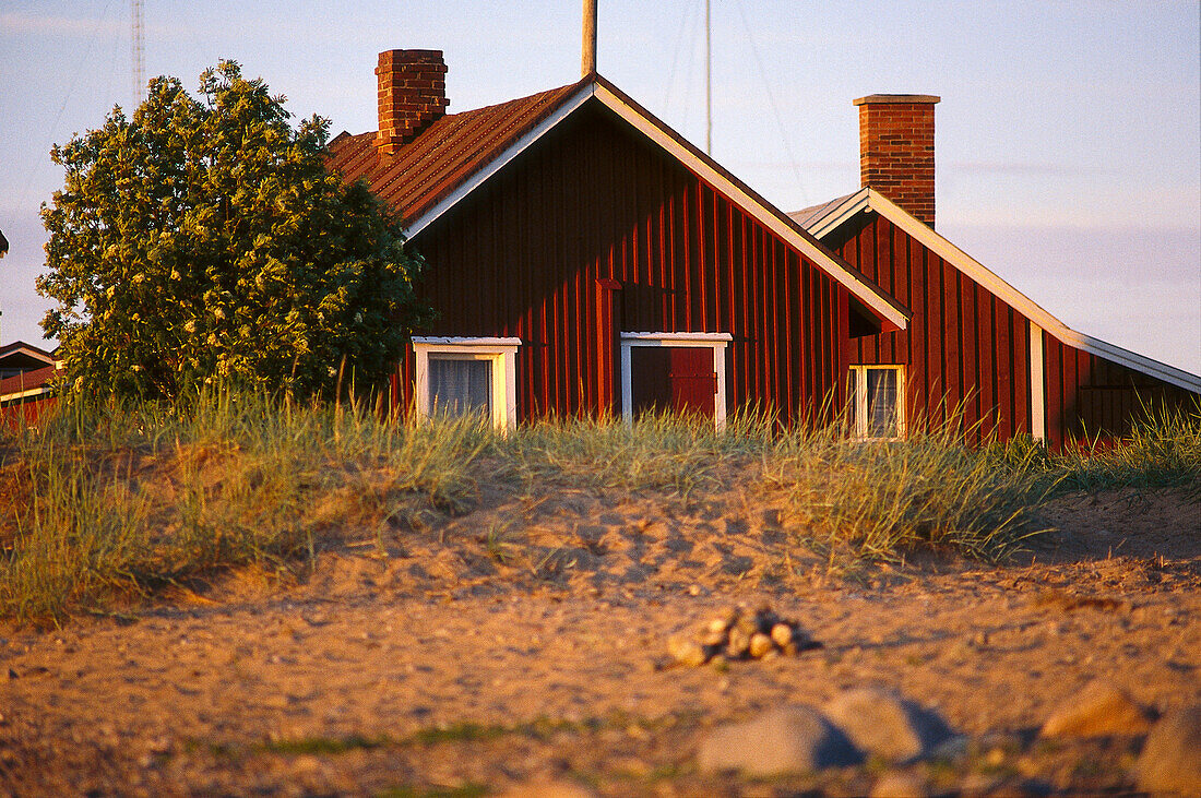 Typical red Finnish wooden houses on Hailuoto, Finnland