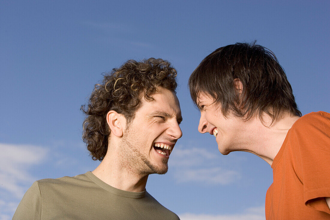 Two young man laughing