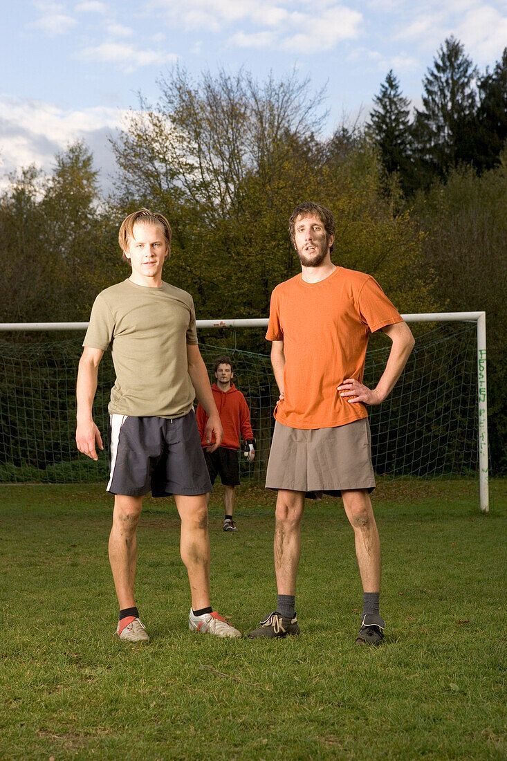 Young men playing soccer