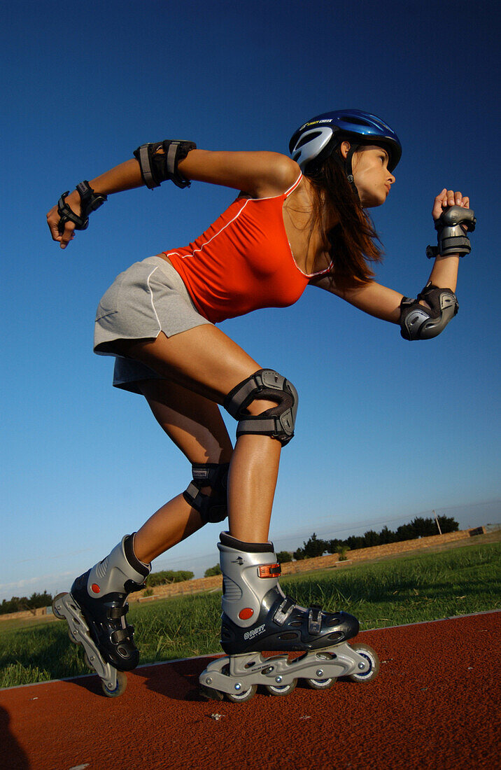 Woman inline skating, Capetown, Southafrica, Africa