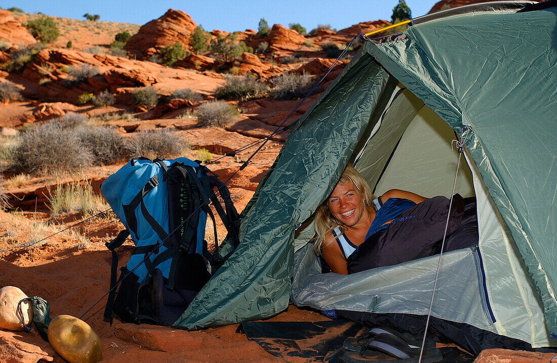 Woman camping, Arizona, USA
