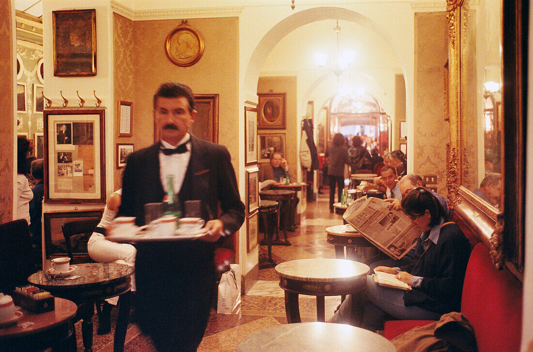 Waiter and guests at Café Greco, Rome, Italy, Europe