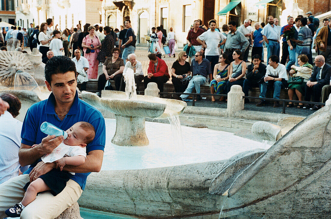Father with Baby, Fountain, Rome Italy
