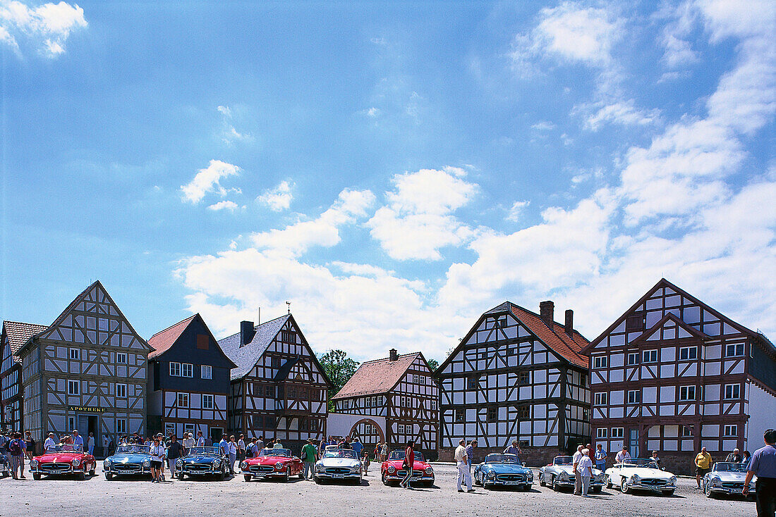 Car show and old half timbered houses in the sunlight, Open Air Museum Hessenpark, Taunus, Hesse, Germany, Europe