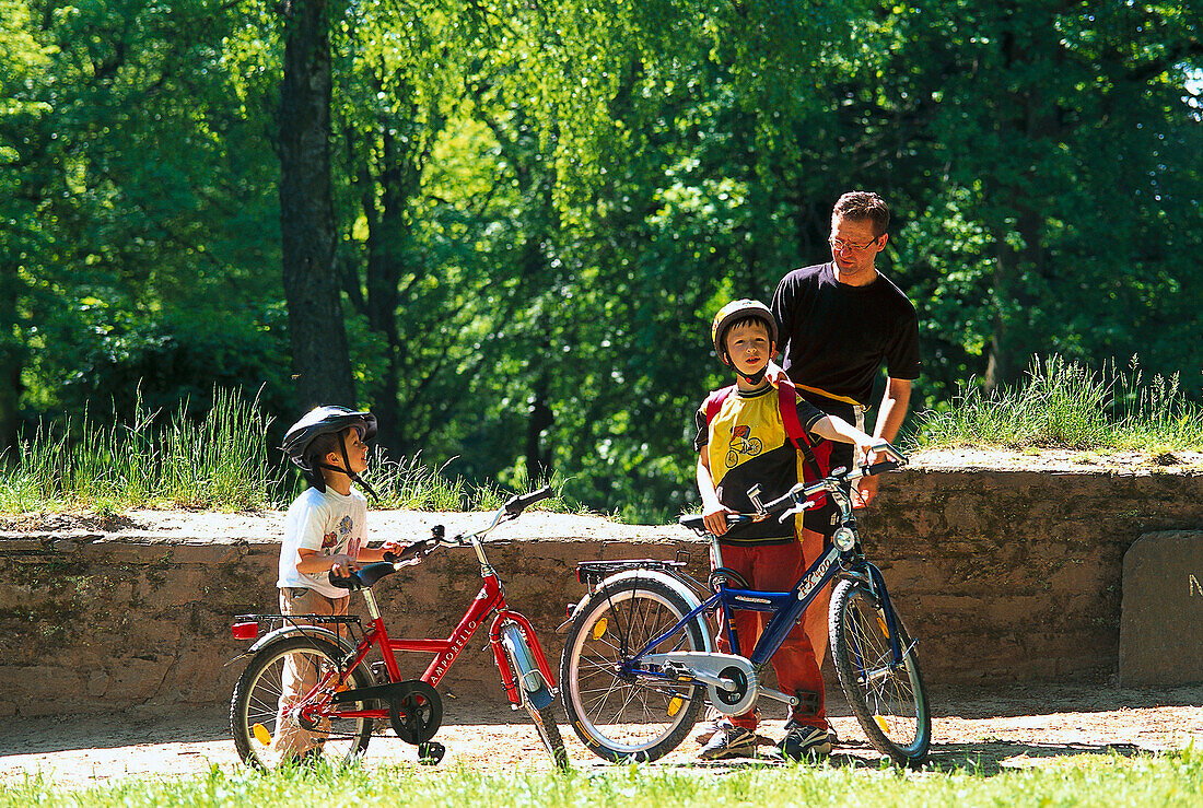 Father and children, Near Roman Fort Taunus, Hesse, Germany