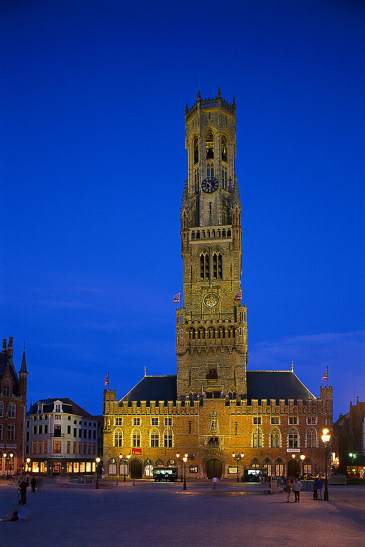 The illuminated tower Belfried at the market square at night, Bruges, Flanders, Belgium, Europe