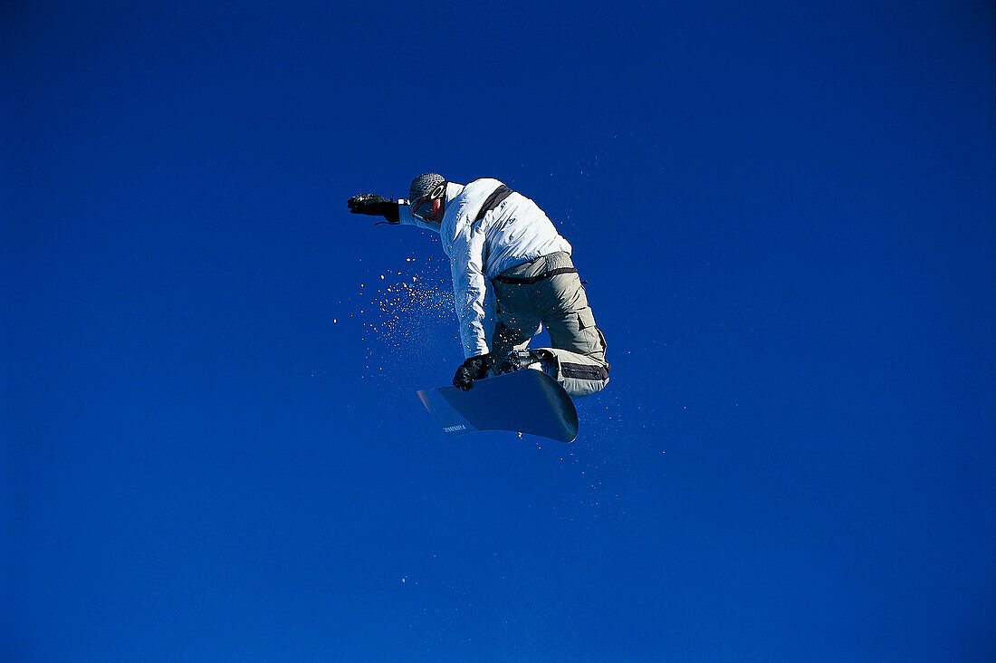 Snowboarder in action, Performing a jump, Kaunertal, Tyrol, Austria