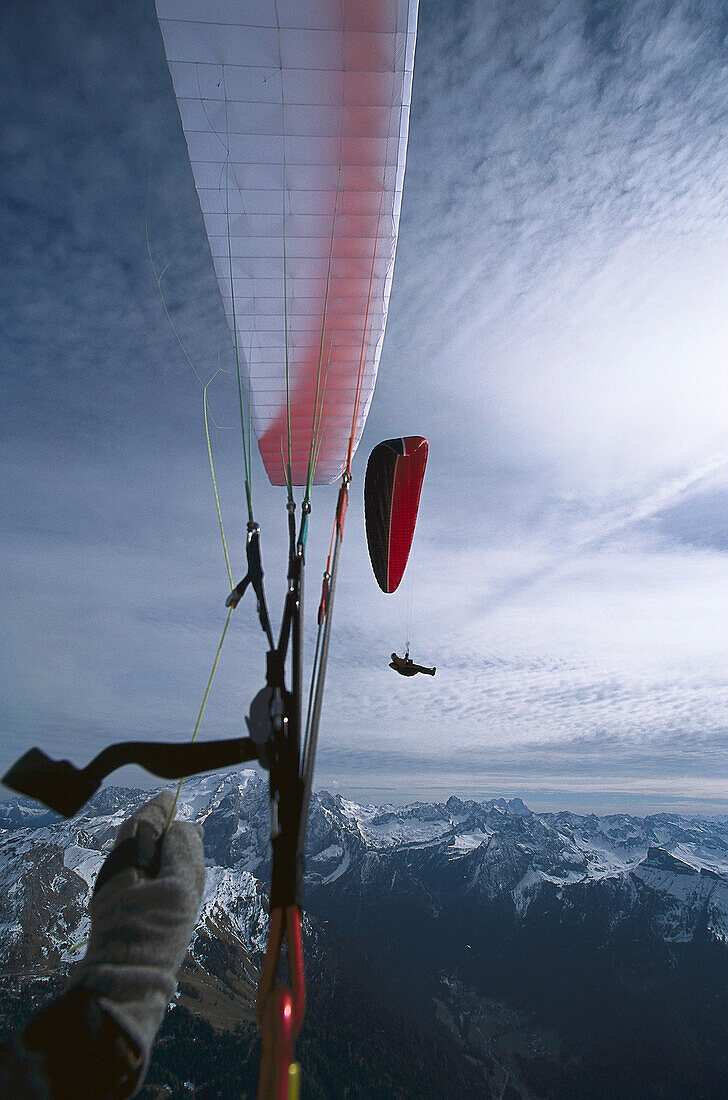 Person paragliding, Sella, Dolomites, South Tyrol, Italy