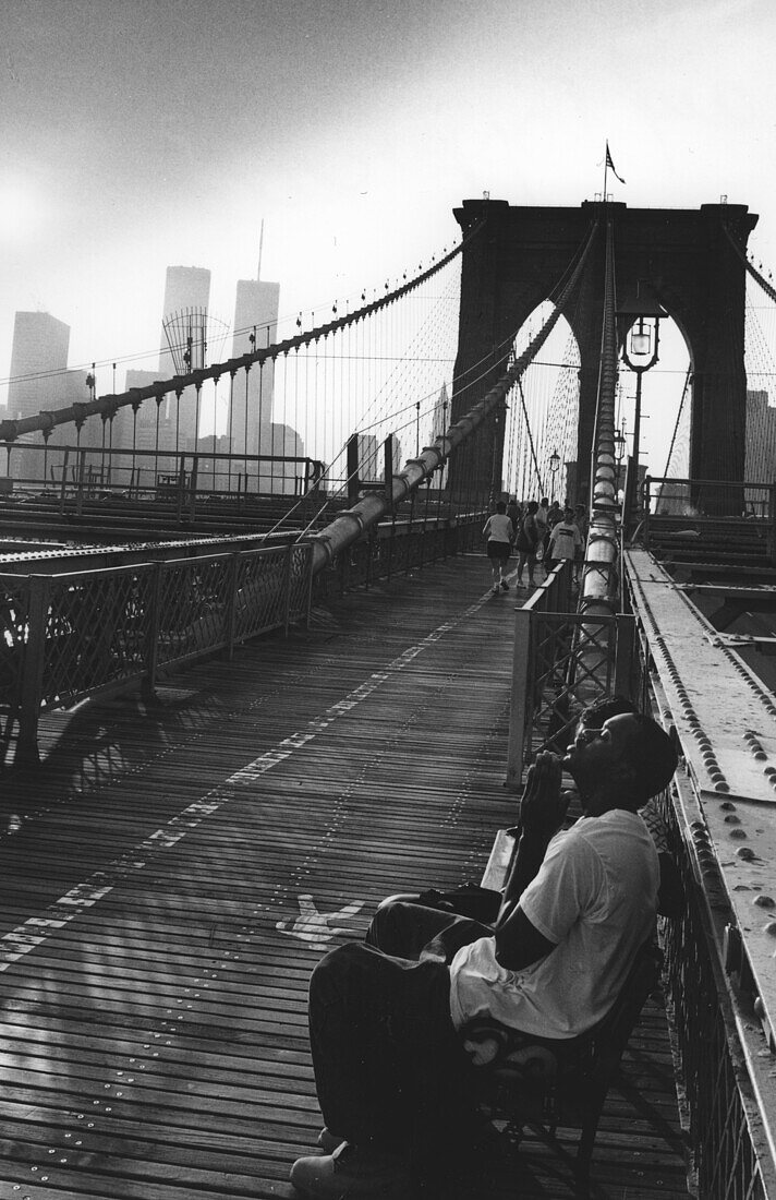 Prayer on Brooklyn Bridge, New York City, USA