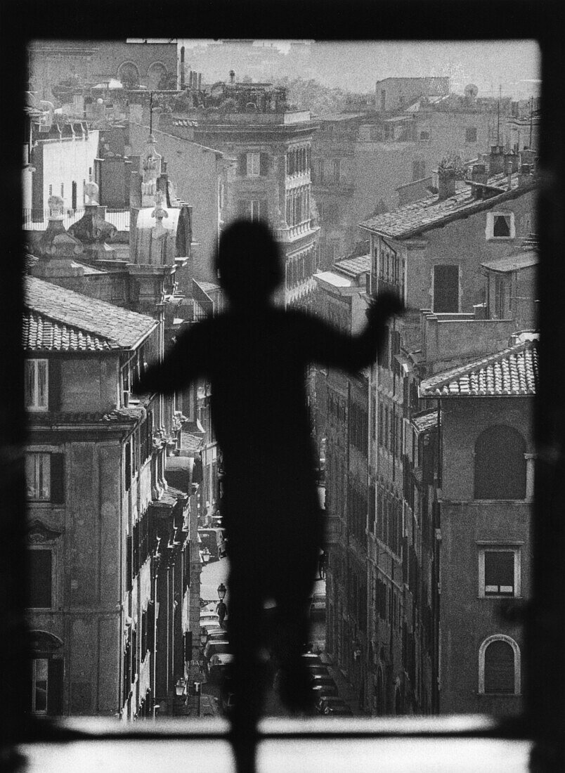 Silhouette of a child in front of Via Spirito, Castello S. Angelo, Rome, Italy