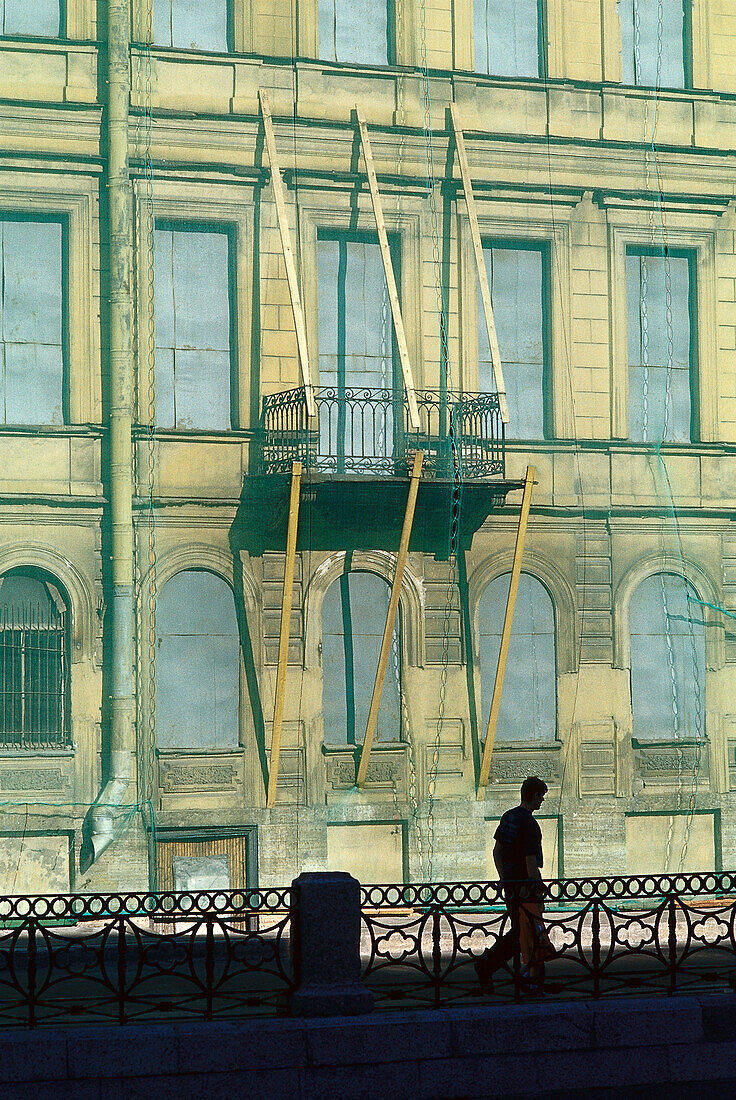 Deceptive realistic house facade on renovating tarp, St. Petersburg, Russia