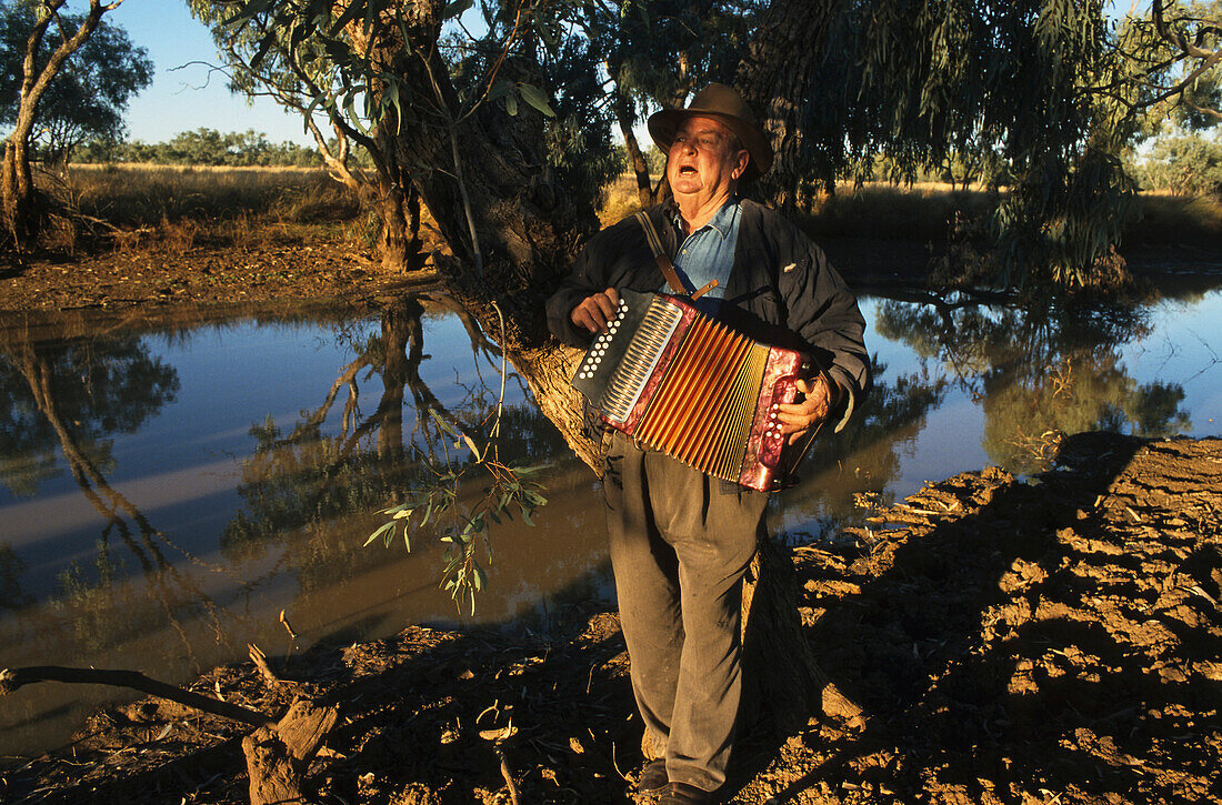 the late Richard Magoffin, local historian, sings Waltzing Matilda Kynuna, Queensland, Australia