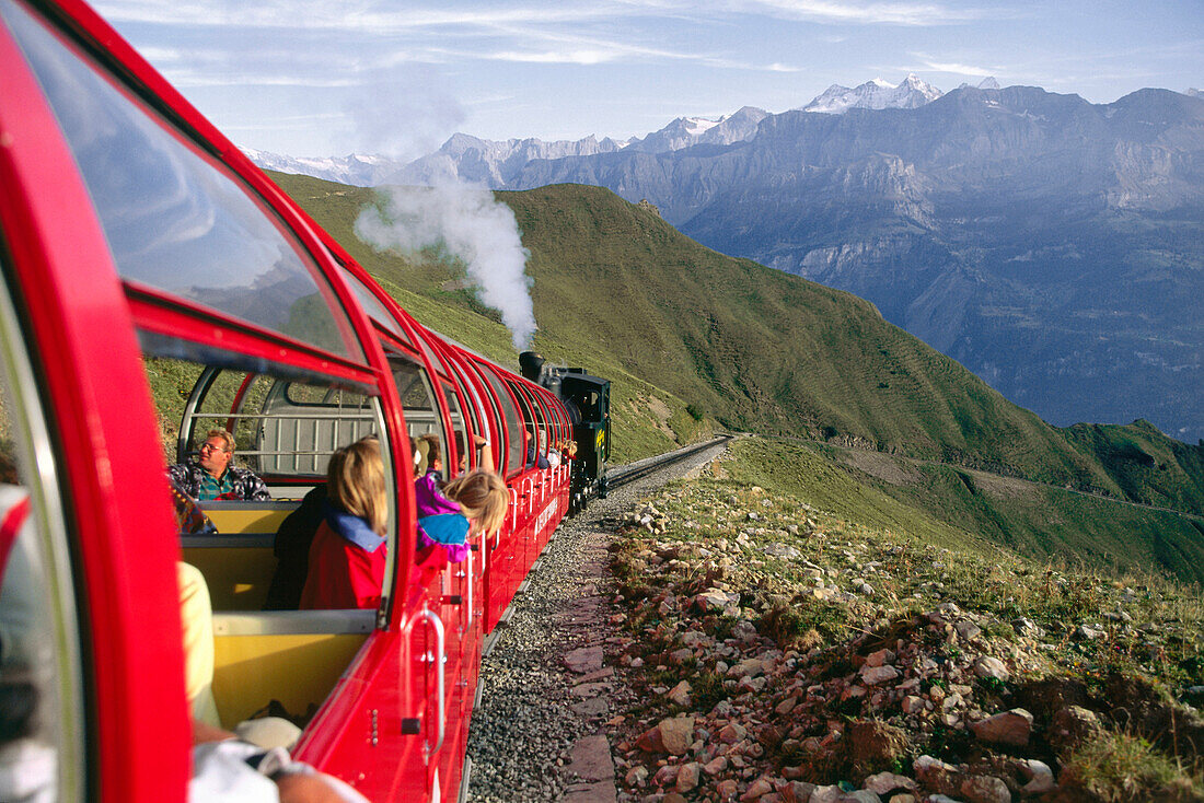 Railway of Brienz, people looking out of window, Berner Oberland, Switzerland
