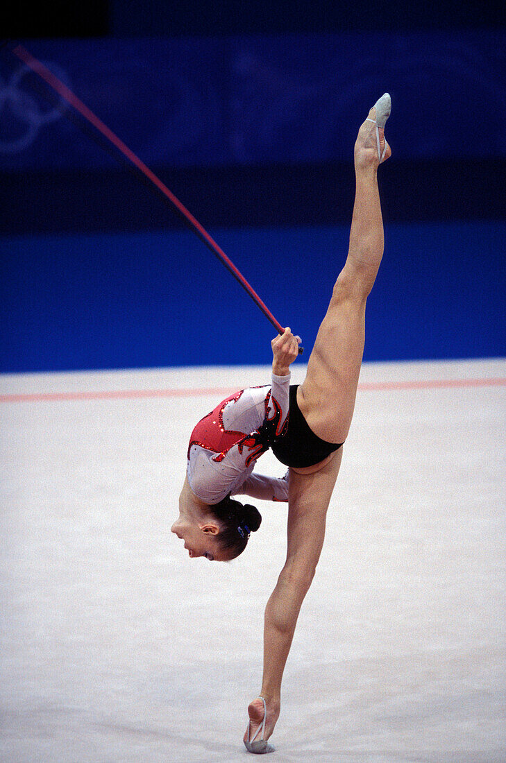 Female athlete doing rhythmic gymnastics, Sydney, Australia
