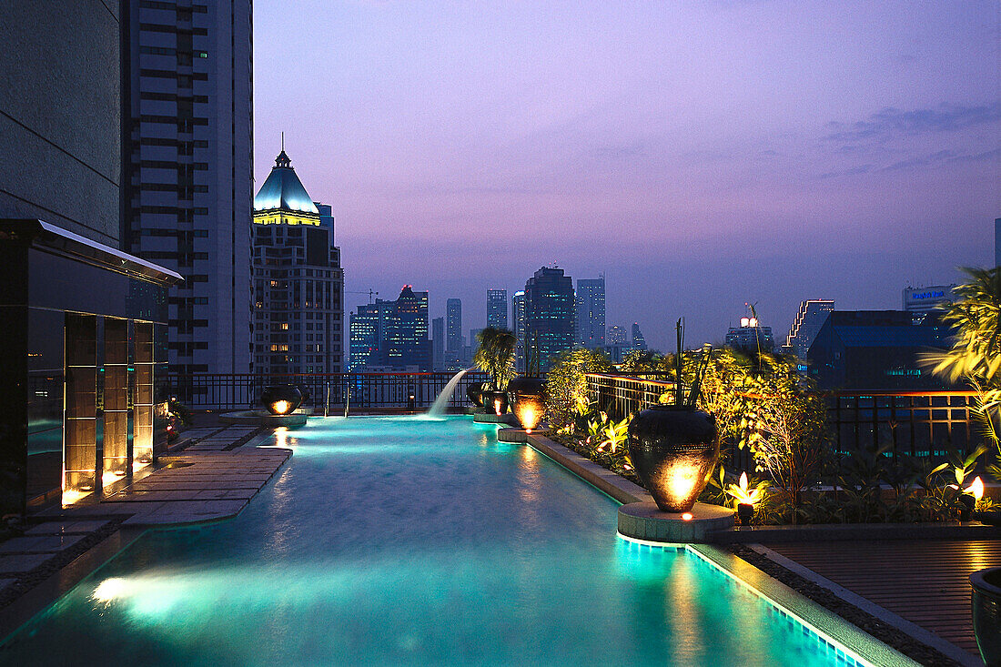 Illuminated pool on the roof of Hotel Banyan Tree, Bangkok, Thailand