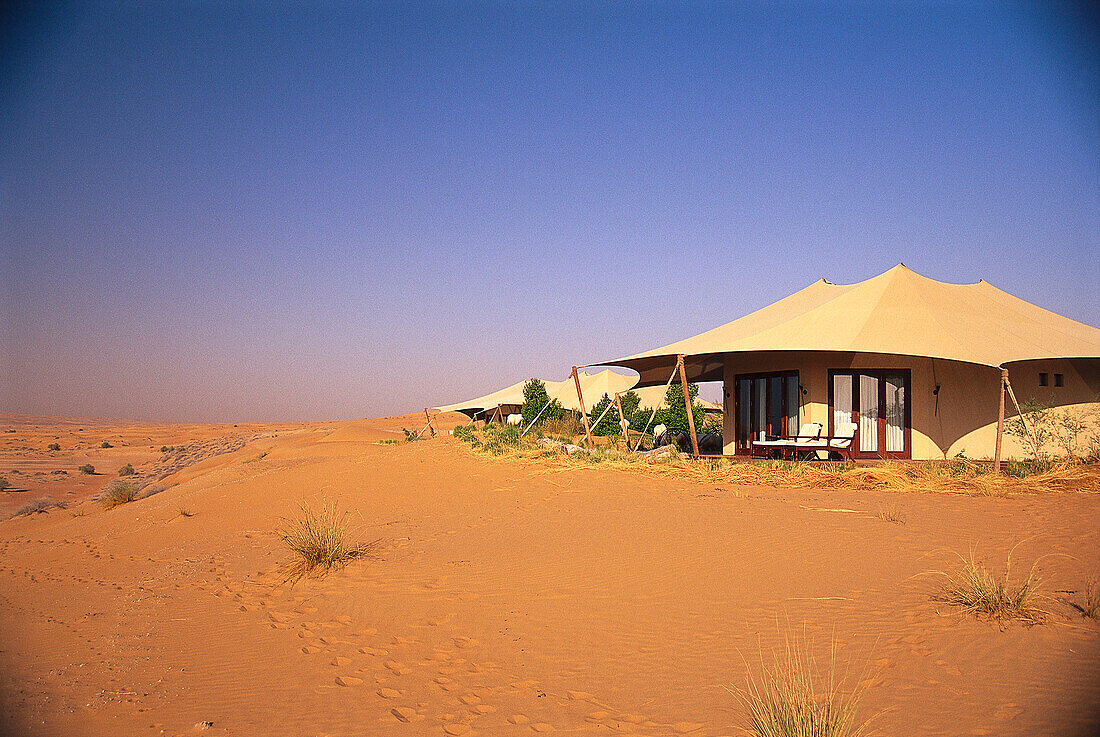 The Al Maha Desert Resort under blue sky, Dubai, V.A.E., United Arab Emirates, Middle East, Asia