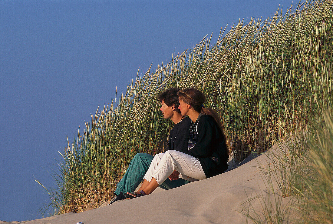 Couple in the dunes, Borkum Isl., Ostfriesische Inseln, North Sea Lower Saxony, Germany