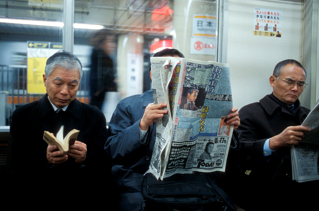 Passengers in subway, Tokyo, Japan