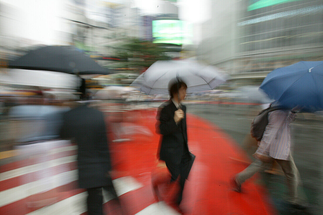 Pedestrians crossing, Rush hour, people in motion Tokyo, Japan