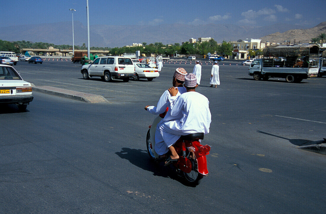 Scooter driver, Nizwa, Oman