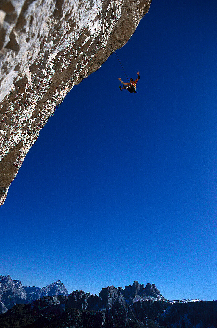 Free climber rappelling, Cinque Torri, Dolomites, Province of Belluno, Veneto, Italy