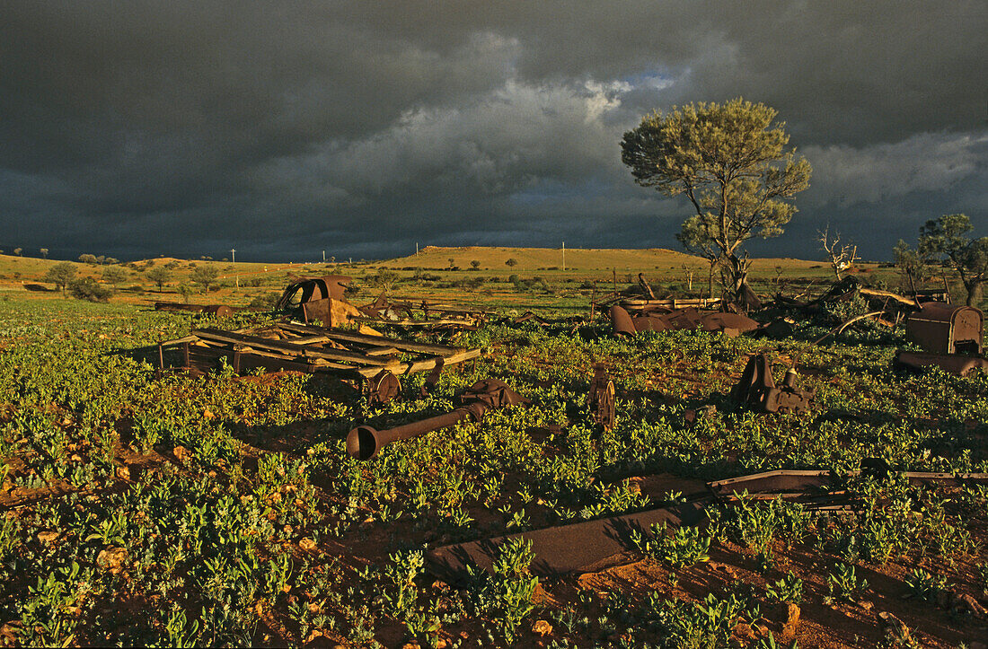 remnants of rusted farm equipment, outback, Australia