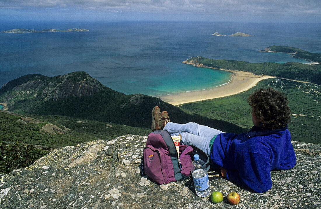 View, from Mt Oberon Wilsons Promontory, Australia, Victoria, resting hiker, coastal panorama, from Mount Oberon, Wilson's Promontory is the southern most point of mainland Australia
