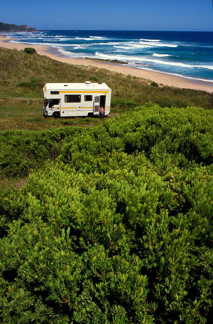 Campmobile near sandy beach, Great Ocean Road, Victoria, Australia
