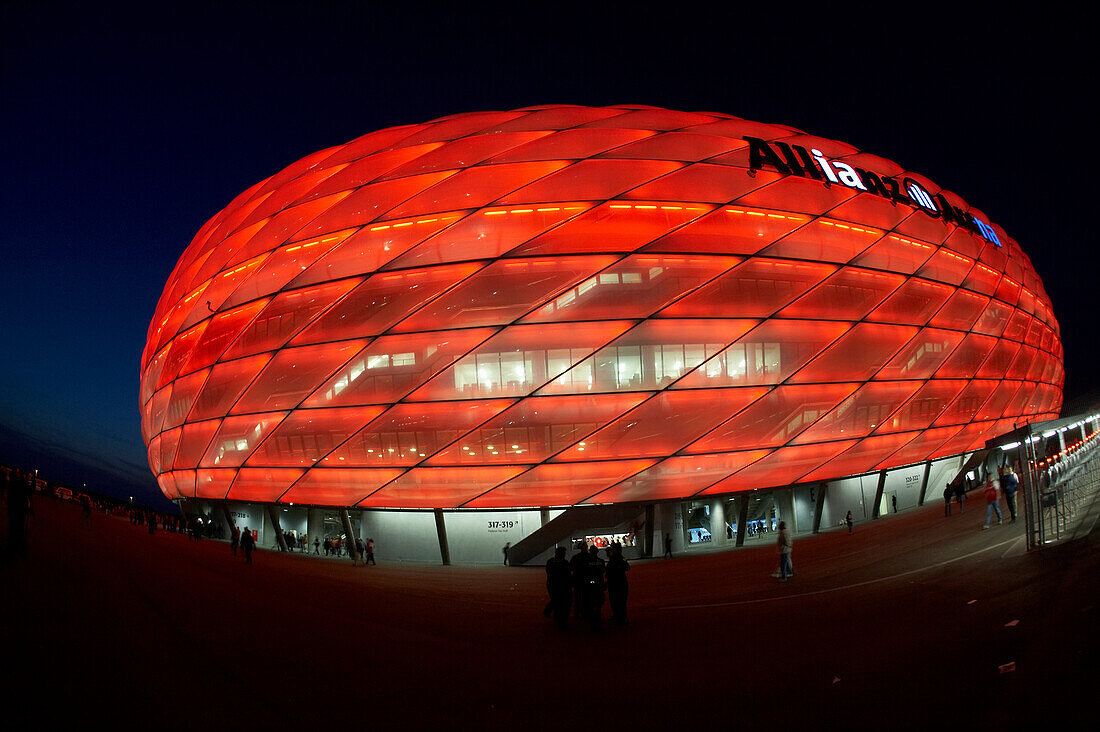 Colorful lit Allianz Arena football stadium at night, Munich, Bavaria, Germany