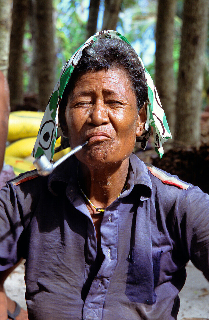 Woman, Smoke, Tikopia, Temotu Province Solomon Islands, South Pacific