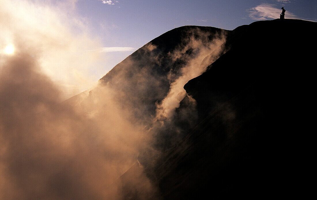 Volcano- person on rim, Tavuvur, Rabaul, East New Britain Papua New Guinea, Melanesia