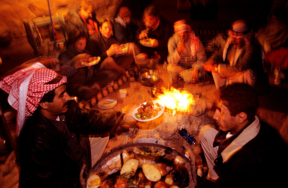 Bedouin dinner around a fire, celebration, Rum village, Wadi Rum, Jordan, Middle East