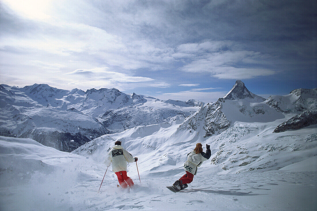 Skifahrer und Snowboarder, Wintersport Zermatt, Schweiz