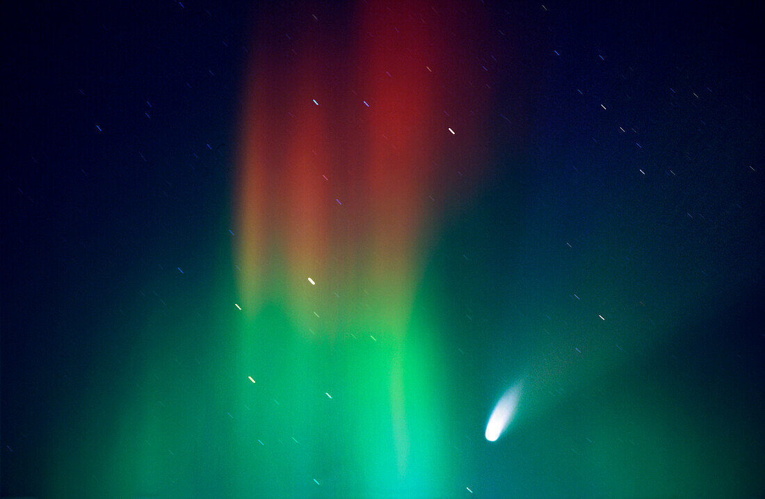 Aurora borealis with Hale Bopp comet star traces, Alaska, USA