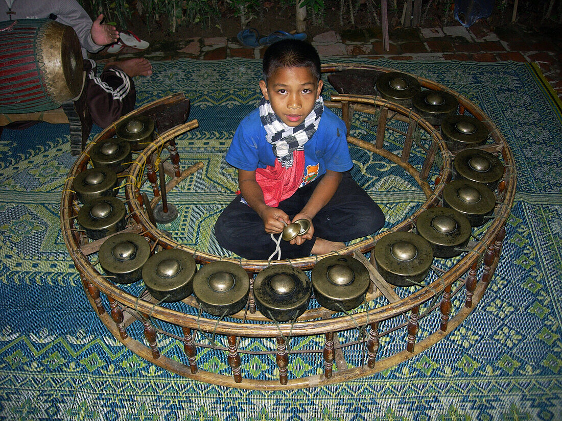 Boy musician, Luang Prabang, Laos Indochina, Asia