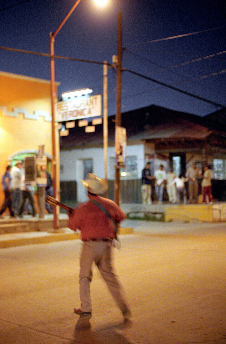 Guitar player at night, creel, chihuahua, mexiko