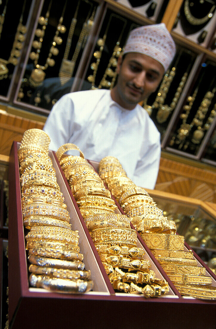Young salesman, gold souk, Muscat, Oman