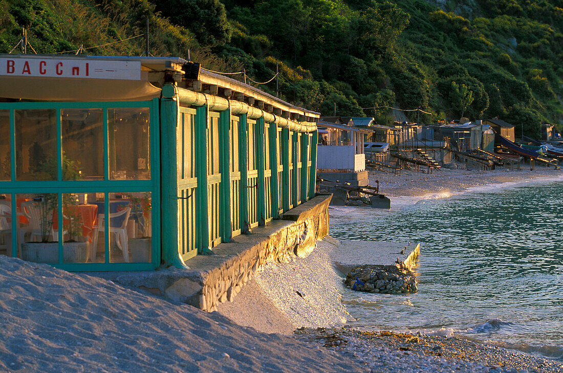 Beachside cafe in the evening sun, Numana, Marche, Italy