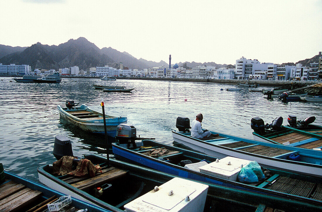 Fishing boats are moored at Muscat harbour, Muscat, Oman