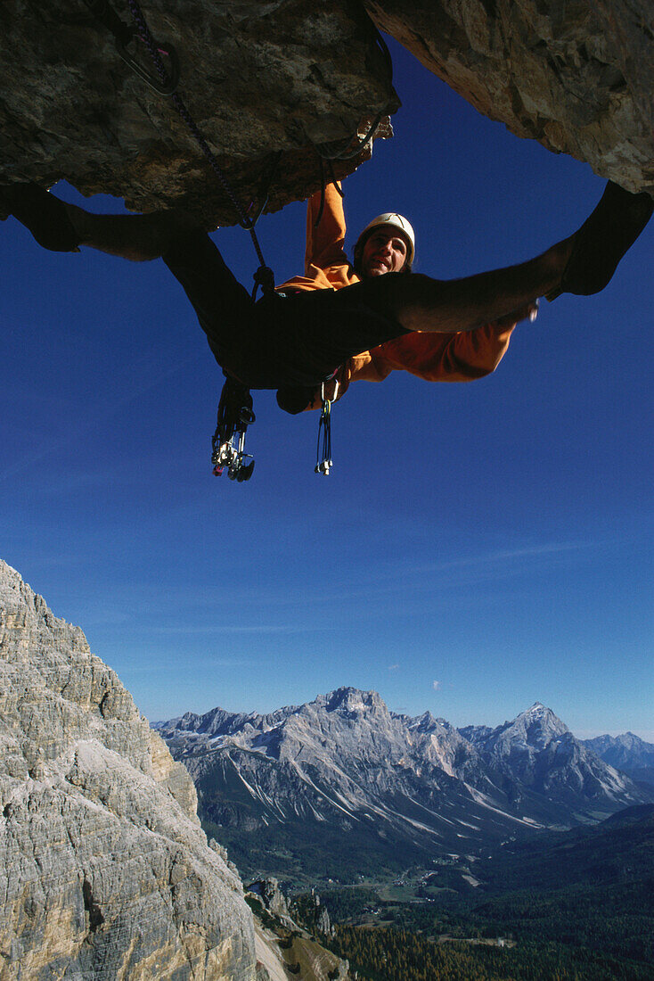 Alpine climber Alex Huber, free climbing, Dolomites, Italy