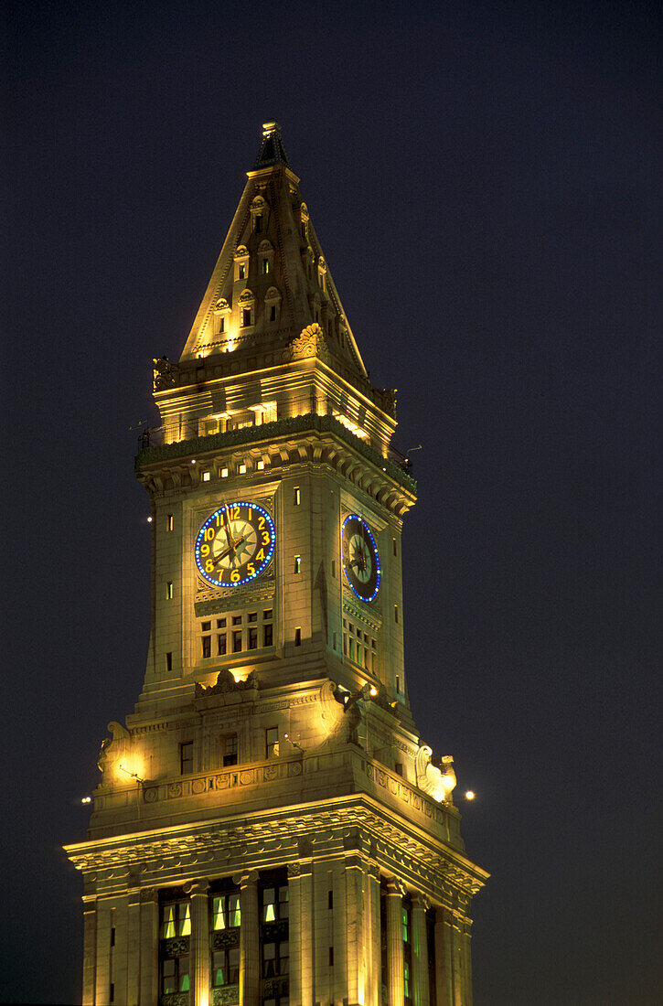 Illuminated clock tower at night, Boston, Massachusetts USA