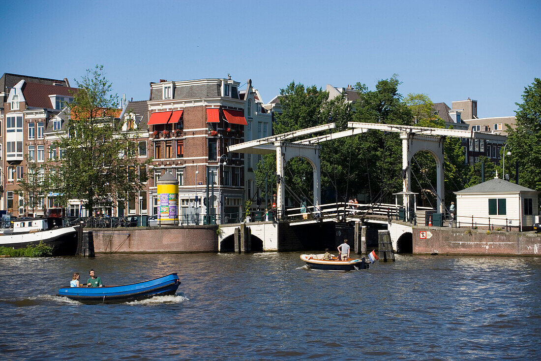 Leisue Boats, Amstel, Bridge, Leisue boats on Amstel in the near of a lifting bridge, Amsterdam, Holland, Netherlands