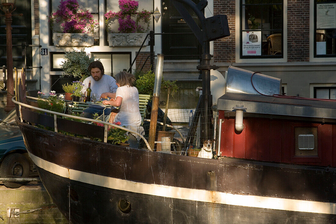 Couple, Diner, Houseboat, Prinsengracht, Jordaan, Couple having diner on a houseboat, Prinsengracht, Jordaan, Amsterdam, Holland, Netherlands