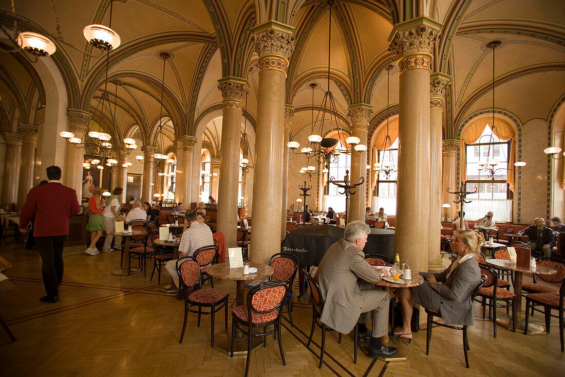 People sitting inside at Cafe Central, Vienna, Austria