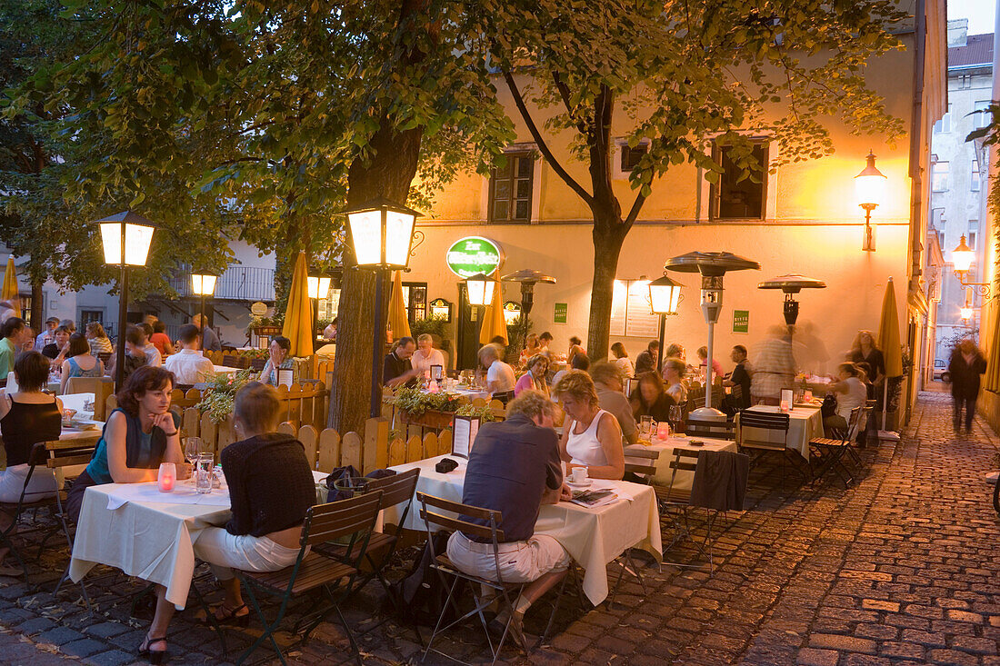 People sitting outside in a typical restaurant, Spittelberg, Vienna, Austria