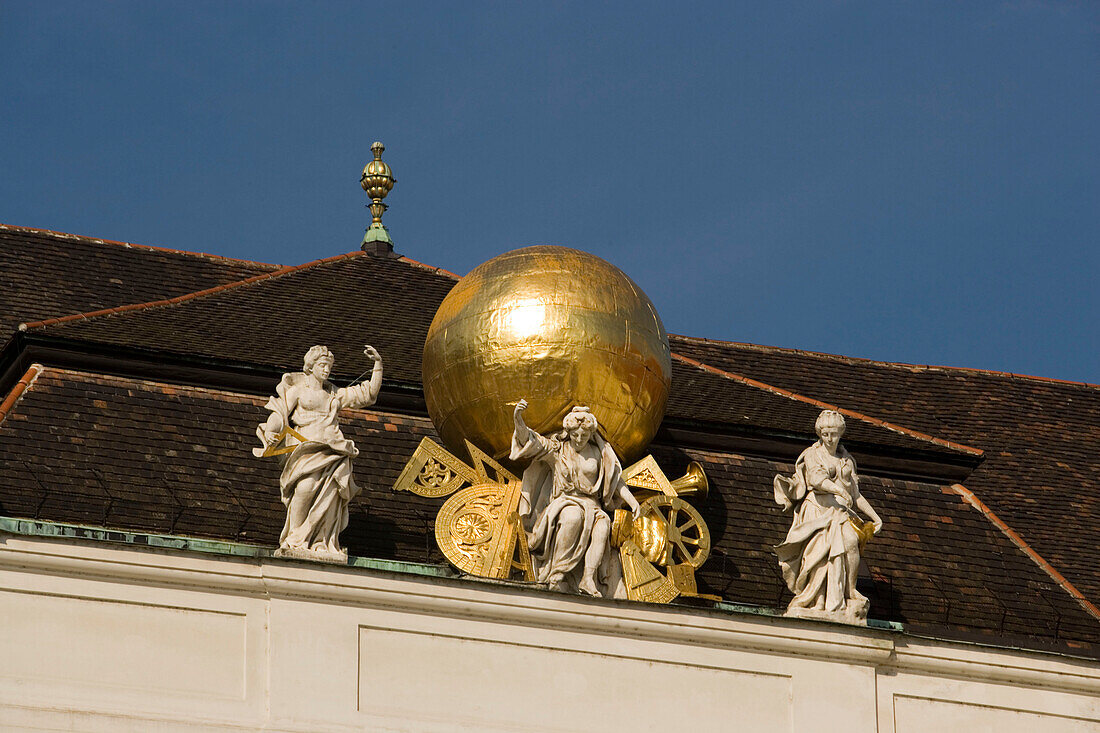 Sculptures on roof of Nationalbibliothek national library, , Josefsplatz, Alte Hofburg, Vienna, Austria